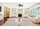 Spacious living room featuring a fireplace and built-in shelving at 2150 Washington St, Columbus, IN 47201