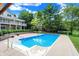 Relaxing pool area with patio and house view at 2150 Washington St, Columbus, IN 47201