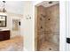 Large walk-in shower with dual shower heads and a tiled bench at 2150 Washington St, Columbus, IN 47201