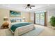 Bright bedroom with a comfortable bed and access to a balcony at 2150 Washington St, Columbus, IN 47201