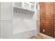 Mudroom with bench seating, cubbies, and hooks at 2150 Washington St, Columbus, IN 47201