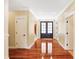 Bright entryway with hardwood floors and double doors at 2150 Washington St, Columbus, IN 47201