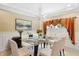 Formal dining room, featuring glass table and chandelier at 2150 Washington St, Columbus, IN 47201
