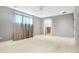 Spacious bedroom with neutral walls and a ceiling fan at 2150 Washington St, Columbus, IN 47201