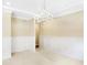 Formal dining room with chandelier and wainscoting at 2150 Washington St, Columbus, IN 47201