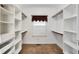 Bright walk-in closet with ample shelving and hanging space at 2150 Washington St, Columbus, IN 47201