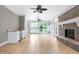 Relaxing sunroom with tile floors and fireplace at 2150 Washington St, Columbus, IN 47201