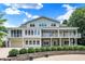 Two-story house with large deck and landscaping at 2150 Washington St, Columbus, IN 47201