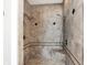 Walk-in shower with dual shower heads and tiled surround at 2150 Washington St, Columbus, IN 47201