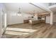 Open concept kitchen with large island and stainless steel appliances at 9317 Coopers Ln, McCordsville, IN 46055
