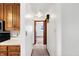 Hallway with light neutral walls and carpeted flooring at 70 Cossell Dr, Indianapolis, IN 46224