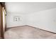 Living room with a view into another room and neutral walls at 70 Cossell Dr, Indianapolis, IN 46224