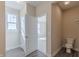 Small bathroom with toilet and open door to bedroom at 5729 Cr W 750 N, McCordsville, IN 46055