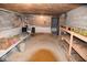 Unfinished basement with storage shelving at 9100 S Us Highway 35, Muncie, IN 47302