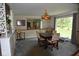 Formal dining room with large windows and wood table at 9100 S Us Highway 35, Muncie, IN 47302