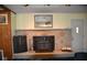 Stone fireplace with wood burning stove in Gathering room at 9100 S Us Highway 35, Muncie, IN 47302