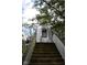 Quaint lighthouse structure with wooden stairs at 9100 S Us Highway 35, Muncie, IN 47302
