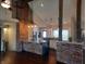 Spacious kitchen featuring an island, stainless steel appliances, and exposed brick accents at 1344 Barth Ave, Indianapolis, IN 46203