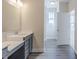 Bathroom with single vanity and access to bedroom and hallway at 5743 Cr W 750 N, McCordsville, IN 46055