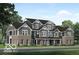 Attractive 3-story townhome with brick and gray siding at 5743 Cr W 750 N, McCordsville, IN 46055