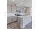 Modern kitchen with gray cabinets and white countertops at 5743 Cr W 750 N, McCordsville, IN 46055