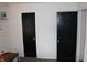 Simple bedroom with two closets and neutral walls at 2312 E 22Nd St, Muncie, IN 47302