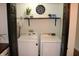 Functional laundry room with washer and dryer at 2312 E 22Nd St, Muncie, IN 47302