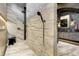 Double shower with marble tile and rainfall shower heads at 9760 Windy Hills Dr, Zionsville, IN 46077