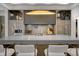 Sleek kitchen featuring a large island and contemporary cabinetry at 9760 Windy Hills Dr, Zionsville, IN 46077