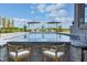 Relaxing pool area with bar, lounge chairs and umbrellas at 9760 Windy Hills Dr, Zionsville, IN 46077
