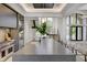 Gourmet kitchen with expansive island and high-end appliances at 9760 Windy Hills Dr, Zionsville, IN 46077