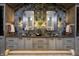 Elegant bathroom with double vanity, large mirrors, and modern fixtures at 9760 Windy Hills Dr, Zionsville, IN 46077