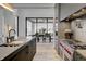 Modern kitchen with professional range and large island at 9760 Windy Hills Dr, Zionsville, IN 46077