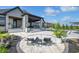 Luxury backyard oasis with a pool and patio furniture at 9760 Windy Hills Dr, Zionsville, IN 46077