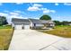 Newly constructed home with a large driveway and attached two-car garage at 10614 N 300 E, Morristown, IN 46161