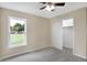 Spacious bedroom with ceiling fan, window, and closet at 10614 N 300 E, Morristown, IN 46161