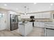 White kitchen with granite countertops, stainless steel appliances, and an island at 10614 N 300 E, Morristown, IN 46161
