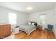 Bright bedroom with hardwood floors and double bed at 1683 Conner St, Noblesville, IN 46060