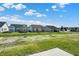 Aerial view showcasing a new community with multiple homes and green spaces at 19663 Atwater Ave, Sheridan, IN 46069