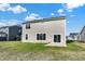 Tan house exterior with backyard and patio at 19663 Atwater Ave, Sheridan, IN 46069