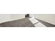 Simple bedroom with gray carpet and an open door to hallway at 19663 Atwater Ave, Sheridan, IN 46069