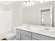Modern bathroom with double vanity and large mirror at 19663 Atwater Ave, Sheridan, IN 46069