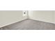 Bright bedroom with grey carpet and a window at 19663 Atwater Ave, Sheridan, IN 46069