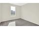 Cozy bedroom with gray carpeting and a large window at 19663 Atwater Ave, Sheridan, IN 46069
