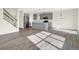 Modern kitchen featuring gray cabinets, stainless steel appliances, and an island at 19663 Atwater Ave, Sheridan, IN 46069