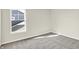 Bright bedroom featuring gray carpet and a window at 19663 Atwater Ave, Sheridan, IN 46069