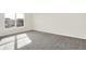 Sunny bedroom with grey carpet and a large window at 19663 Atwater Ave, Sheridan, IN 46069
