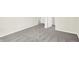 Empty bedroom with grey carpet and doors at 19663 Atwater Ave, Sheridan, IN 46069