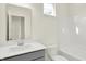 Clean bathroom with gray vanity, white toilet, and shower/tub combo at 19663 Atwater Ave, Sheridan, IN 46069