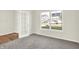 Bright office space with wood flooring, gray carpet, and a view of the neighborhood at 19663 Atwater Ave, Sheridan, IN 46069